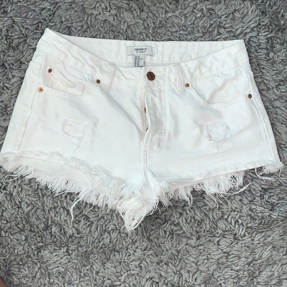White distressed shorts